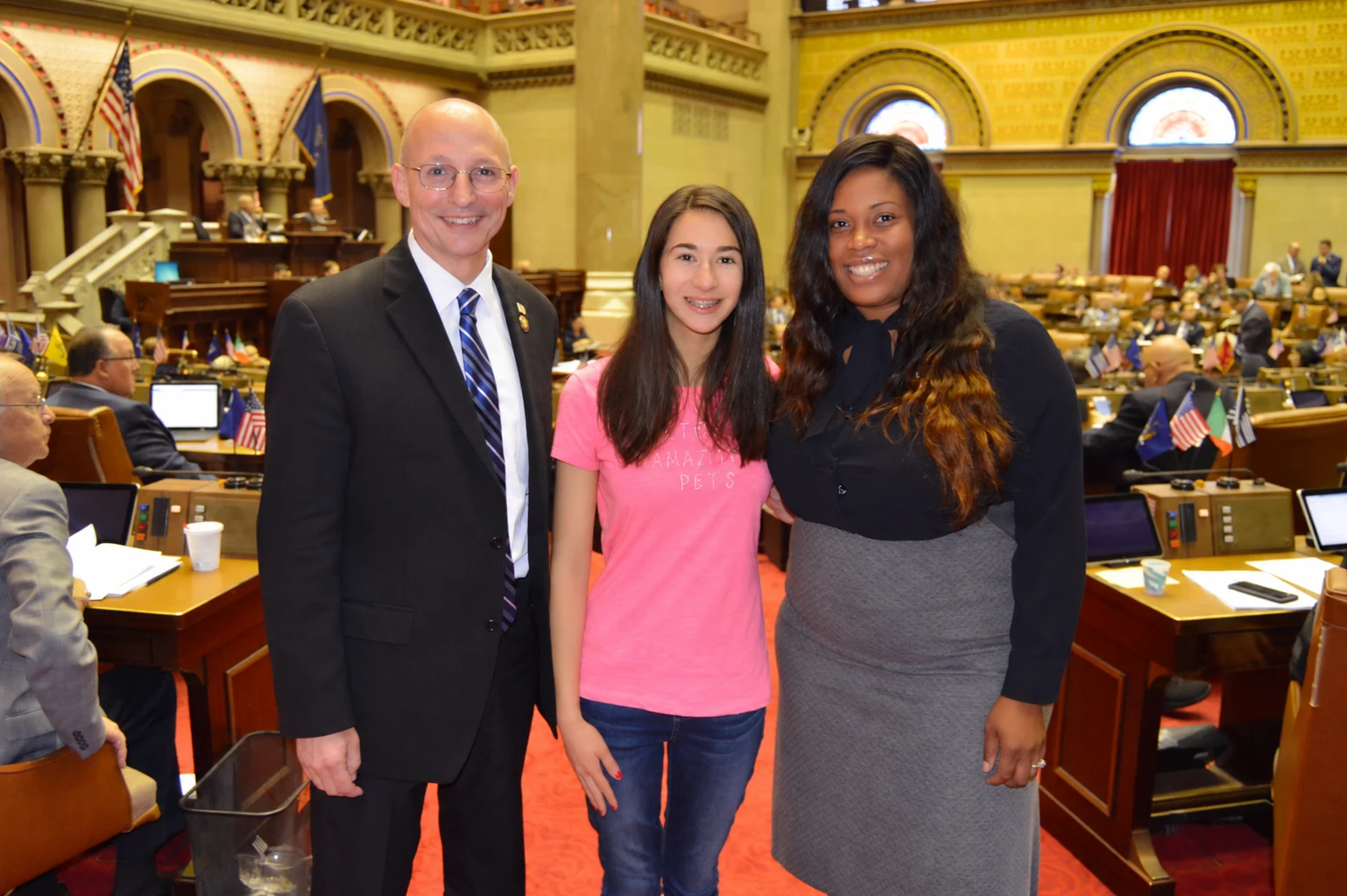 Victoria being recognized in the New York State Assembly chamber