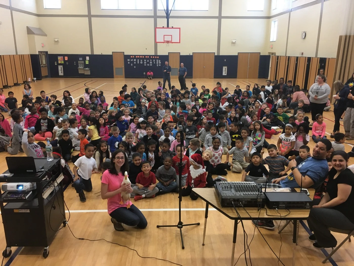 Victoria with a large group of students at Riverhead Charter School