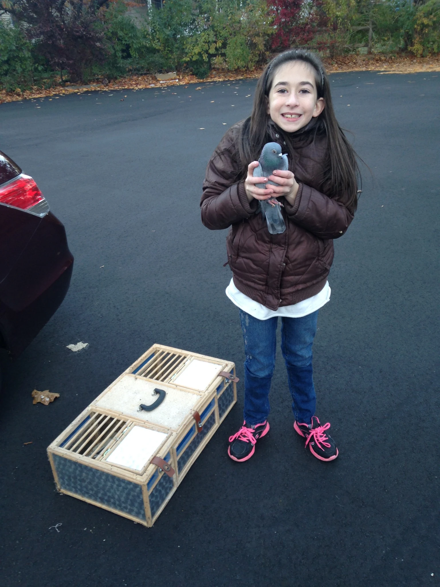 Young Victoria holding a pigeon