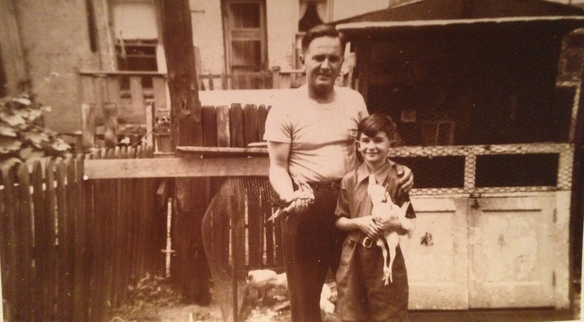 Victoria's grandfather and great-grandfather at their Brooklyn pigeon and chicken coop in the 1940s